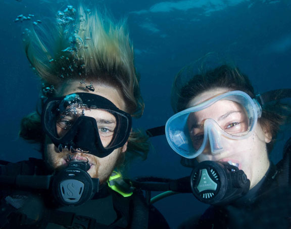 Two happy scuba diving buddies - click to go to Scuba Diving page