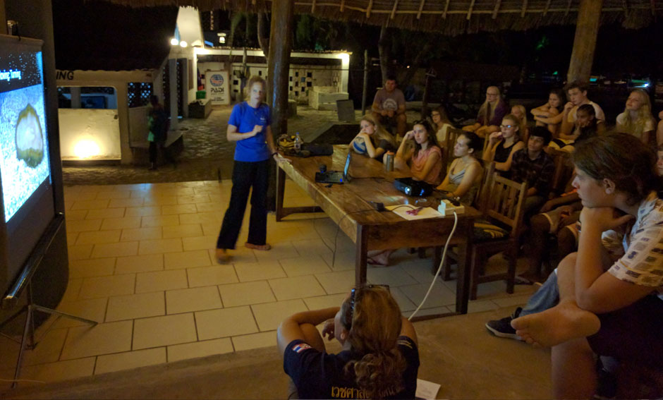 Students at evening presentation by Ulli, Chumbe Island Marine Biologist learning about coral bleaching